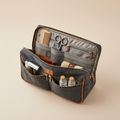 Open travel grooming organiser bag showing compartments with grooming tools